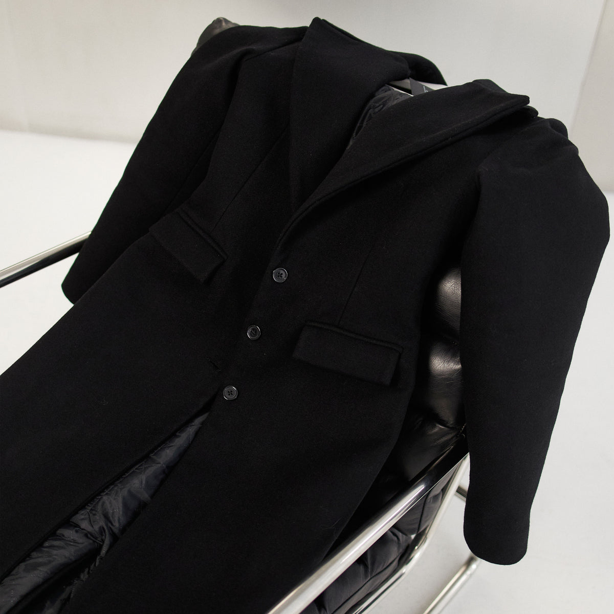 COAT WITH OVERSIZED SHOULDERS